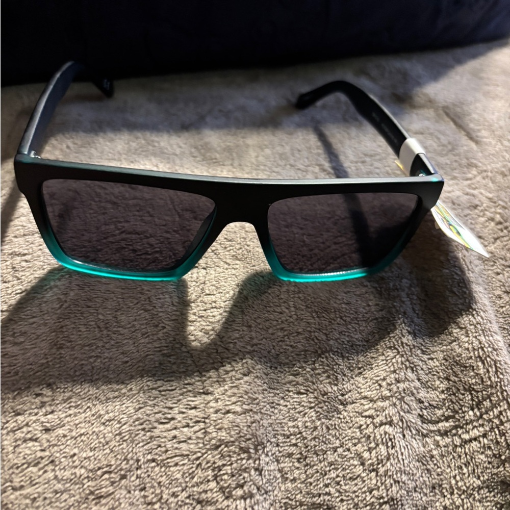 Foster Grant Surge Black and Teal Sunglasses. NWT